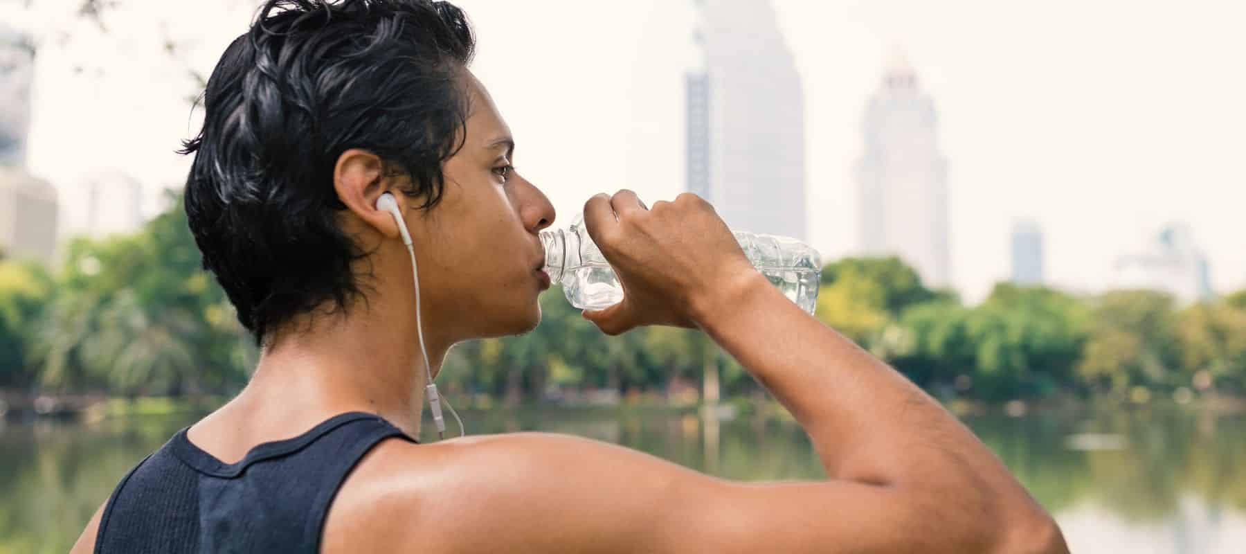 man drinking water