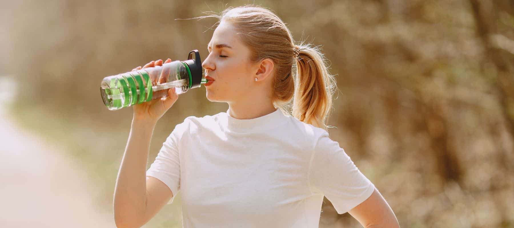 woman staying hydrated